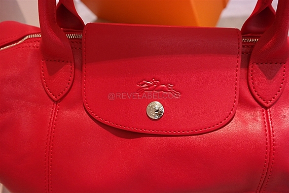 Shop Longchamp Le Pliage Cuir Medium Handbag with Strap